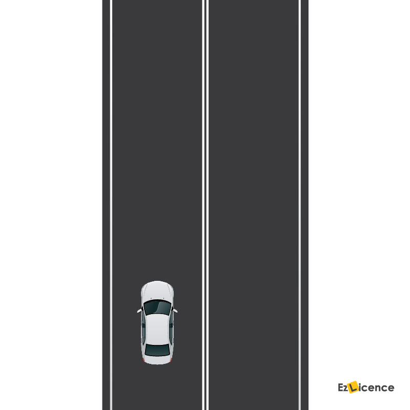 A section of road is marked with double unbroken dividing lines as in the diagram. When is a vehicle allowed to cross these lines?