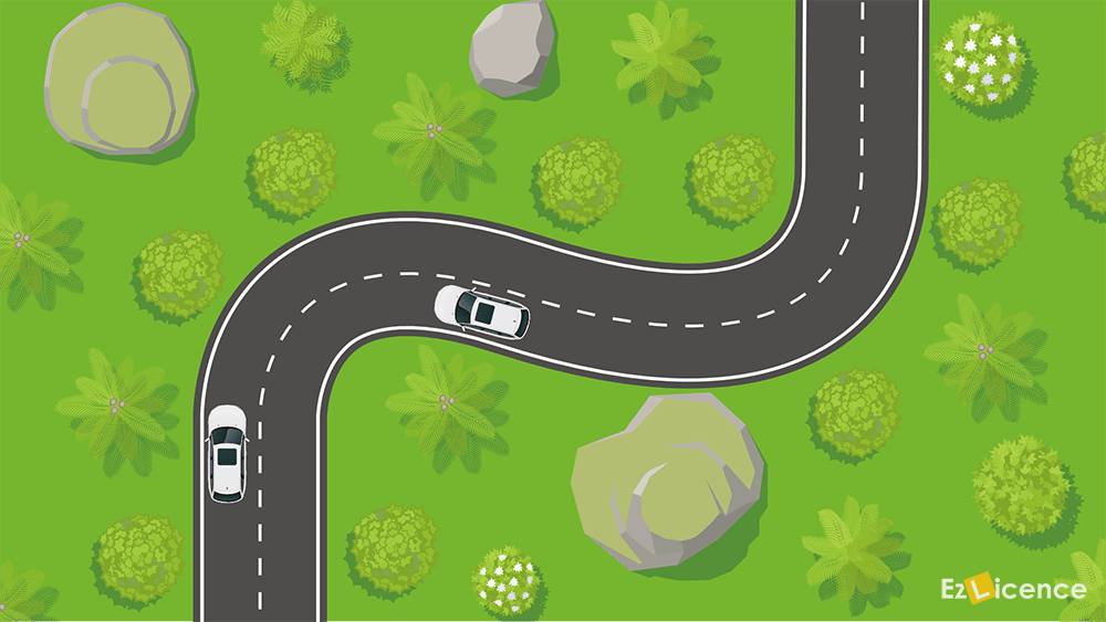 You are approaching a hill or curve. You must not cross the centre line to overtake -