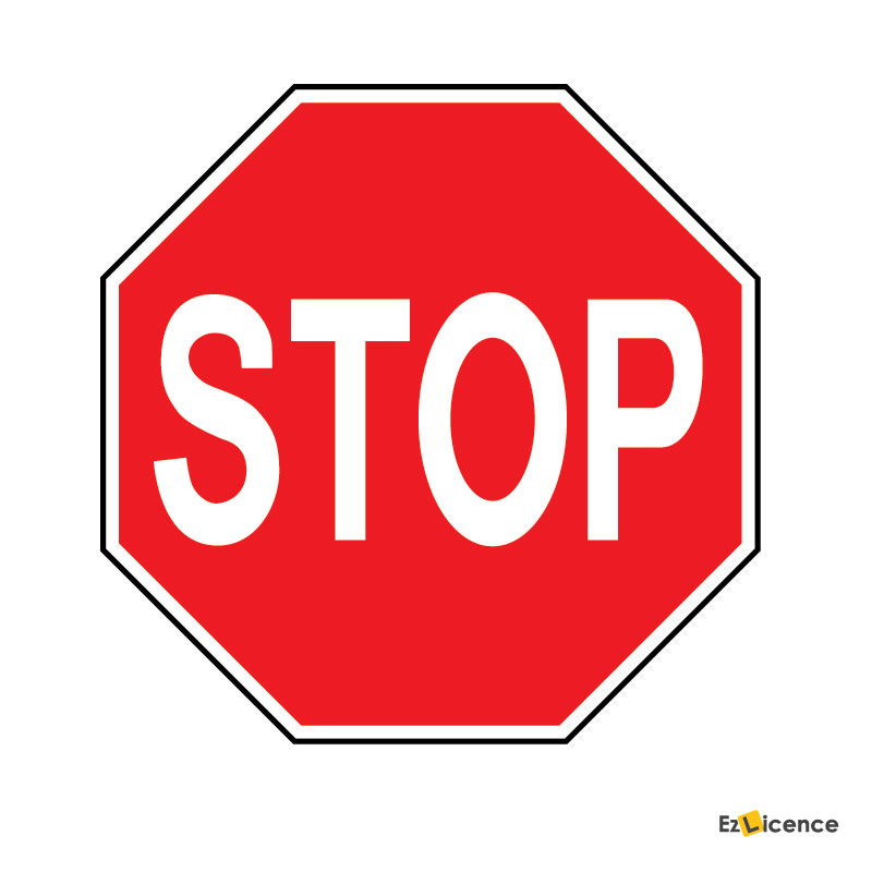You drive up to an intersection with a stop sign. There is no painted stop line. Where should you stop?
