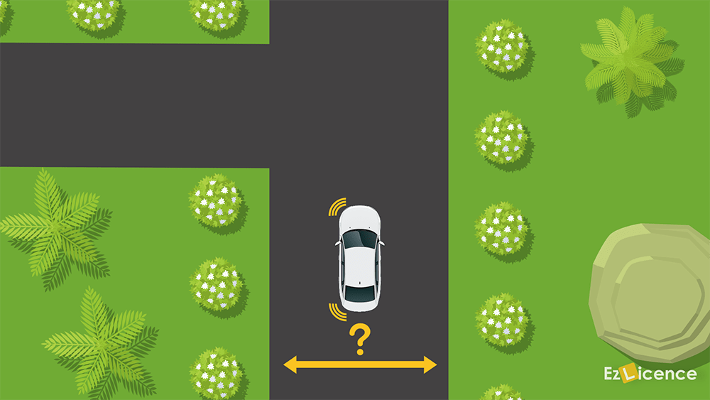 On an unmarked road, what position must your vehicle be before making a left-hand turn?