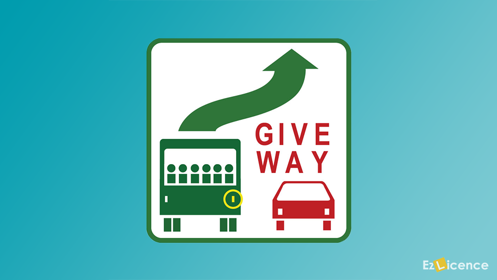 You are driving in a built-up area (like a city or town). A bus is stopped at a bus stop in the left lane next to you and has this sign displayed. There are parked vehicles in front of the bus and it has signaled right. What must you do?