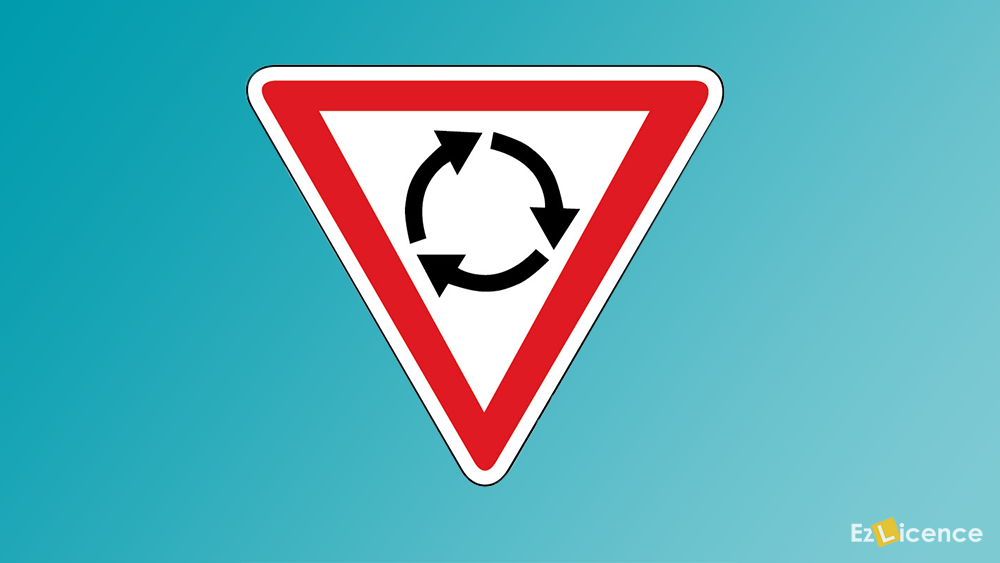 You are driving towards a roundabout and you see this sign.You must -