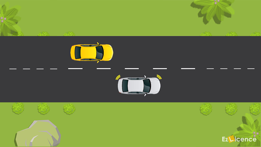 If an overtaking vehicle signals that it must move in, in front of you, you should -