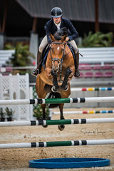 Guillermo Carballal and 'Remembrance' take a rail in the jump off in a time of 34.210 sec