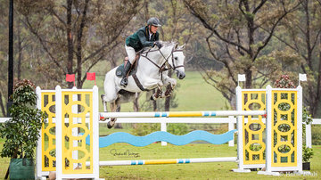 Chris Chugg and 'Cera Carlina' place fifth taking a rail in the jump off