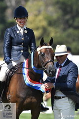 EA Ring 1 judge, Mark Jacobi is pictured sashing Sabrina Neave's Champion Newcomer Galloway, 'Elmtree Sensation'.