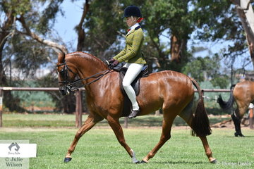 Izabella McIntyre rode Blaine Perkin's well performed, 'Mirinda Fortitude' to claim the Riding Pony Show Hunter Pony Championship.