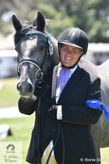 A delighted Jamila Davis is pictured with her two year old, Clydesdale/Warmblood/Percheron, 'Harley Davidson'  after winning the class for Lady Handler Youngstock in the Clydsdale Cross Sport Horse Association ring.