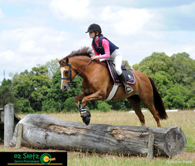 With her first ride out on cross country, Mia Taylor takes a step out of the hack ring to have an early morning lesson with coach Rebel Morrow. 