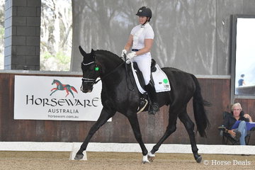 Successful  Victorian dressage rider, Justine Greer rode , 'Revelwood Stedfast' to score 79.02% for fifth place in round one of the Four Year Old Young Dressage Horse class.