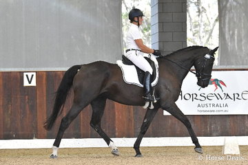 Vanessa Griffiths rode the Victorian bred, 'Mayfield Three Wishes' to earn 78.80% in round one of the Four Year Old Young Dressage Horse class.