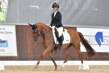 Faye Hinchliffe who was having a very busy day in the extreme heat, rode Cheraton Stud's, 'Cheraton Mona Lisa' to win the 4yo Young Pony Round One.