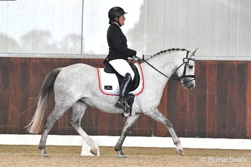 Bettina Kopetzky riding 'The Silver Rose' won the 6 yo Young Pony Round One.