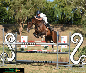 Out of World Cup mare, Alice, Hayden James rides James' Carrera in the 1.20m Championships on the final day of the Australia Day Show Jumping Championships.
