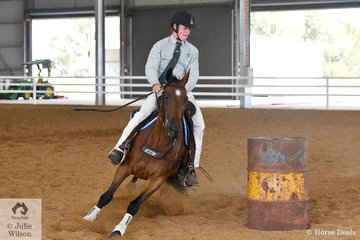 Well performed young rider, Jarod Healy is pictured aboard, 'Condamine Liberty Belle' during the Junior Barrel Race Riders 13 AU 18 Years.