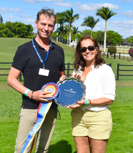 Carl Hester receives the Premier Equestrian Award  at the Adequan® Global Dressage Festival CDI 5*- JRPR’s Joann Weiber presenting (JRPR Photo)