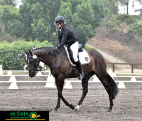 Despite the rain making a heavy appearence during their test, Shai Dever and Wildfires Illusion prove to beat the odds and end up in first place after the dressage in the EvA95C Junior.