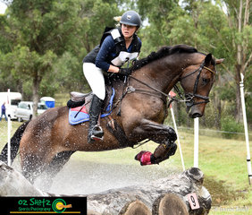 Current NEGS student, Anna Jarvis and Joleka Leome make a splash as they exit the EvA95 water complex at the Sydney Eventing Summer Classic.