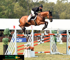 Even with plenty of air time, Alpha Activity and Tom McDermott finish their Open 1.40m Jump Off round clear and stopping the clock with a time of 43.90 seconds which put them into first place.