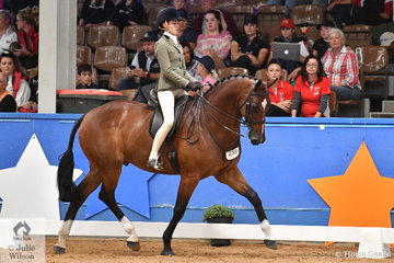 Representing Queensland, Paris Graham rode Samantha Watt's, 'Extatic GHP' by showjumper, Elias C to take third place in the Child's Small Show Hunter Hack Championship.
