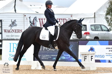 Nicole McOwn rode, 'Mellizo Park Furst  Dance' to take second place in Round 1 of the Seven Year Old Young Horse Championships.