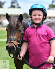 A delighted five year old Wyatt Ollie won the class for Brushed Paddock Pony/Horse.