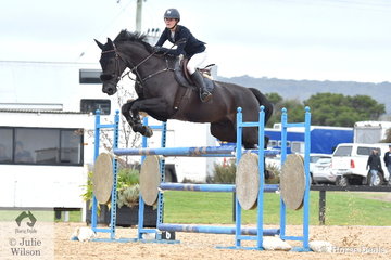 Jessie Rice-Ward from NSW rode a clear round on Denison Park Style in the Open 130cm Art. 238.2.1.