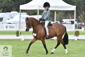 Holly Backman rode her mother, Jenna Backman's. 'DP Popeye' to make Top Ten in the Child's Small Show Hunter Pony Championship.