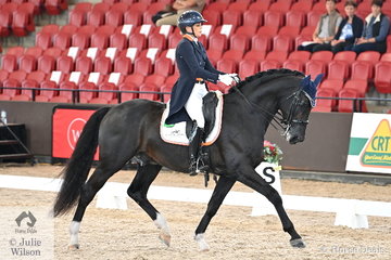 Riding for New Zealand, Holly Leach rode her 'HP Fresco' by Fackeltanz to second place in the Intermediate 1 Freestyle with 71.375%. 