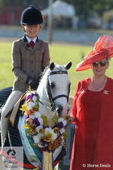 Glamorous Judge, Kerry McGlone is pictured with her Champion Small Hunter Pony, 'Rivington True Royalty', exhibited by Melissa Harding and ridden by Georgia Cronin.