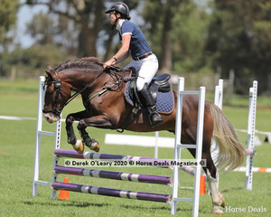 Lauren Lines riding "Fluff" in the 65cm Show Jumping Age Group 40-49 y/o