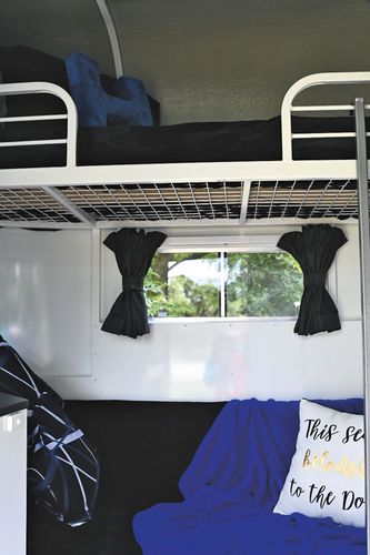 The two adult size bunks run along the right hand side (facing forward) of the float. Anthony has the top bunk from which he has a good view of the TV.