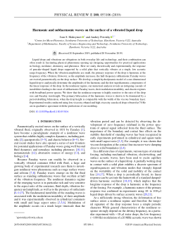 Harmonic and subharmonic waves on the surface of a vibrated liquid drop
