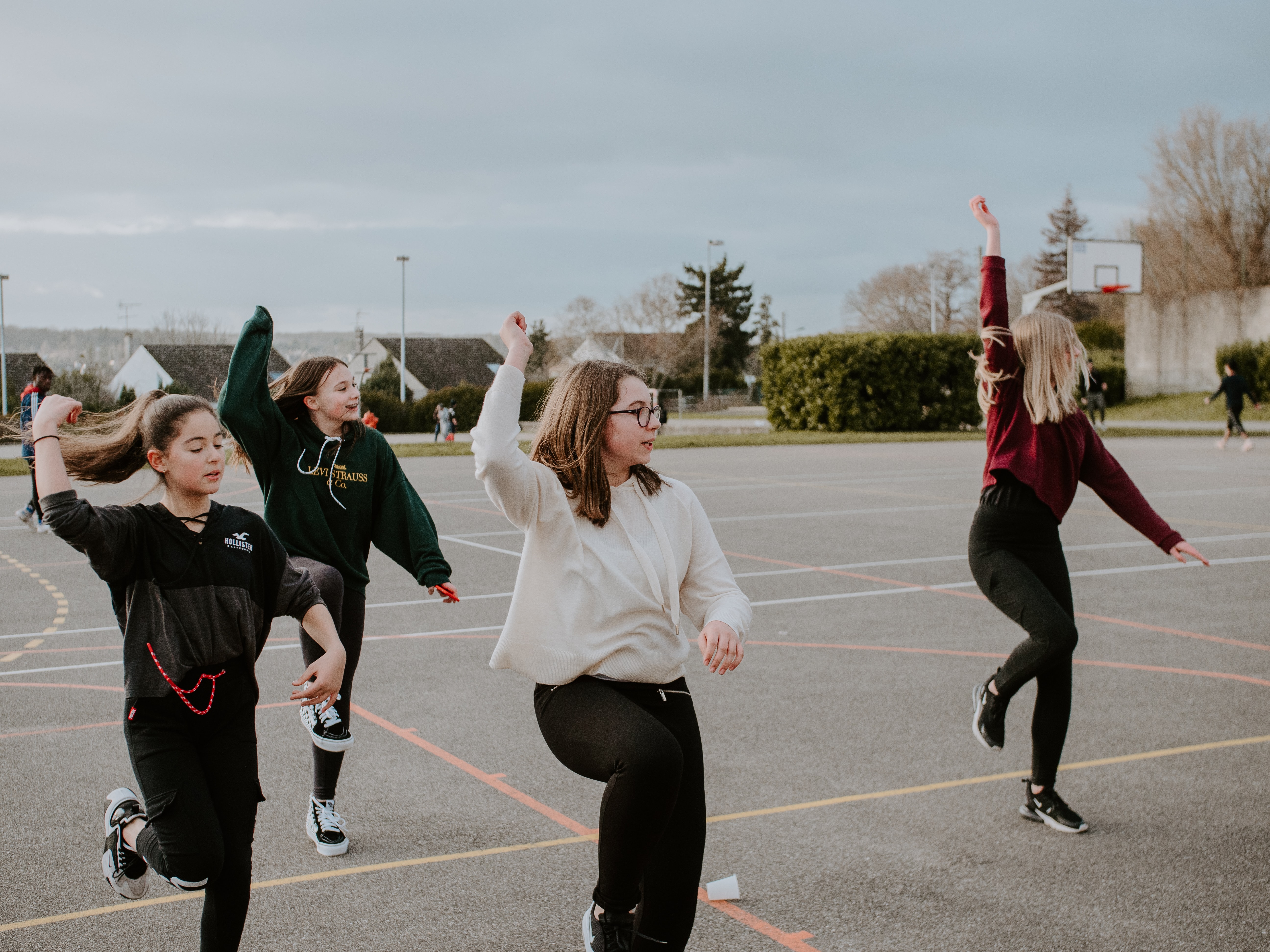 Year 10 students gathering on a court