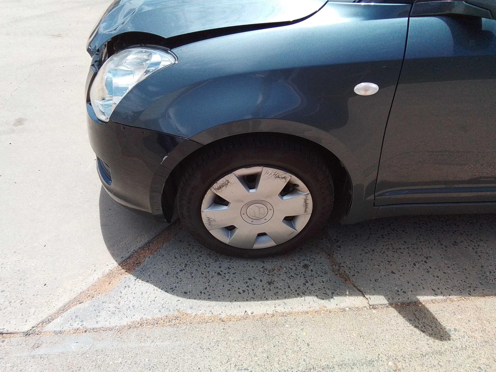 View Auto part Caliper Suzuki Swift 2010