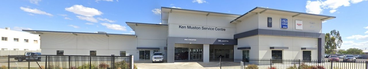 Page Banner - Rear Vision Mirror with Blurry Traffic