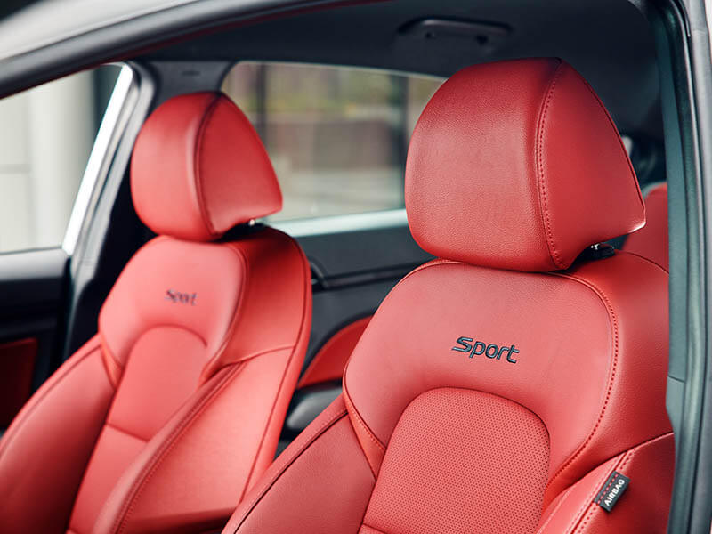 Red leather appointed interior.