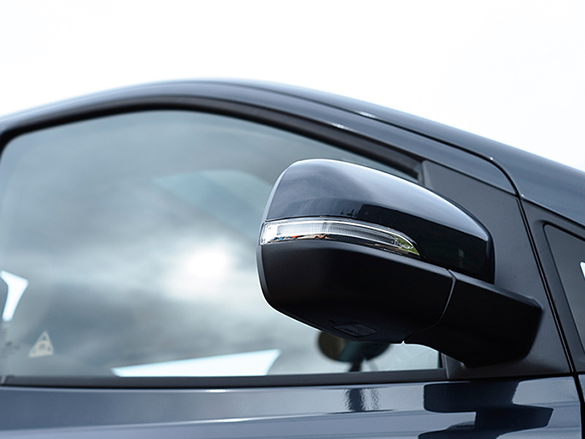 Electric folding mirrors with integrated side repeater.