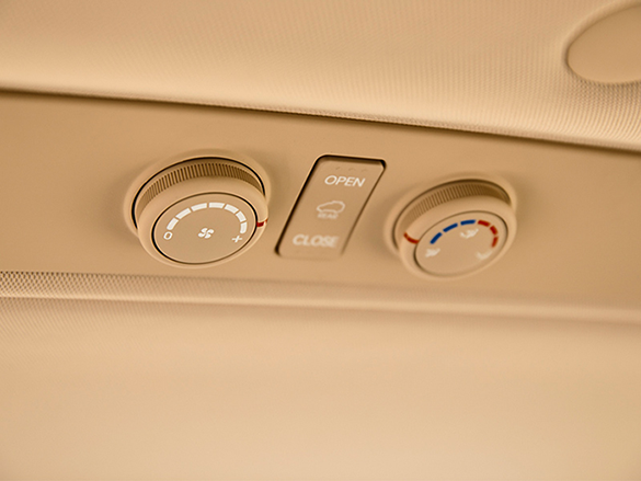 Separate air conditioning air vents and controls for 2nd & 3rd row passengers.