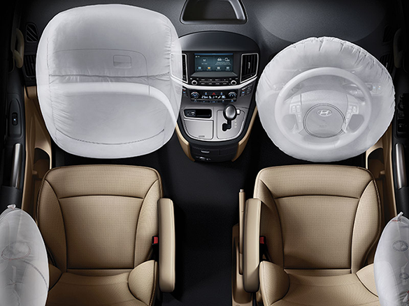 Dual front & side airbags.