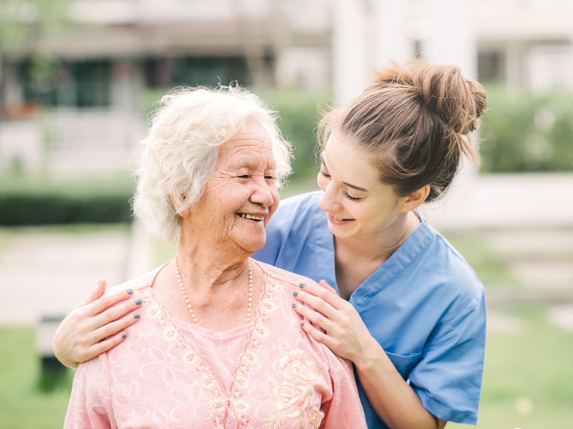 Older woman with an aged care support worker.