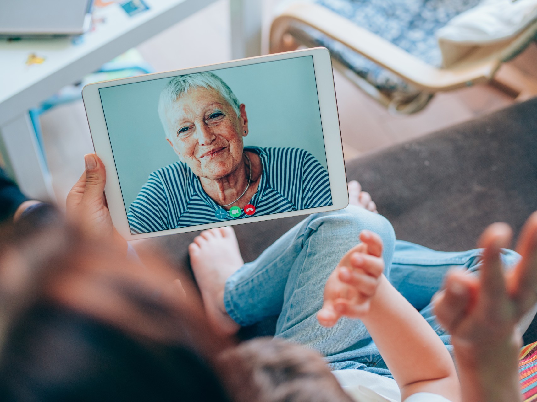 Older person on a video call with family