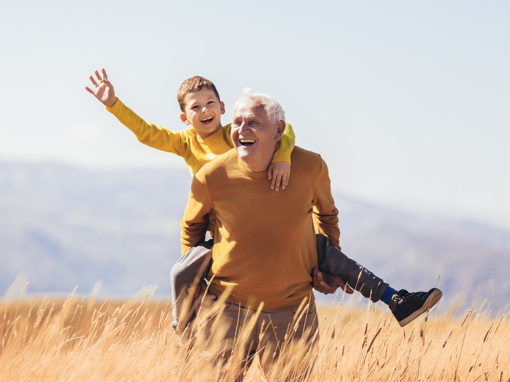 Grandfather going for a hike with his grandson.