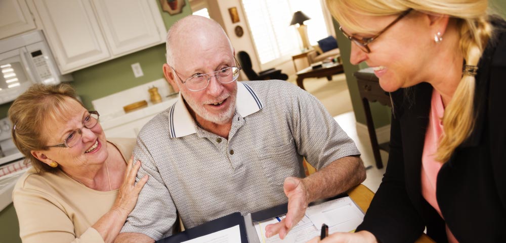 A man and his wife talking with an ACAT member
