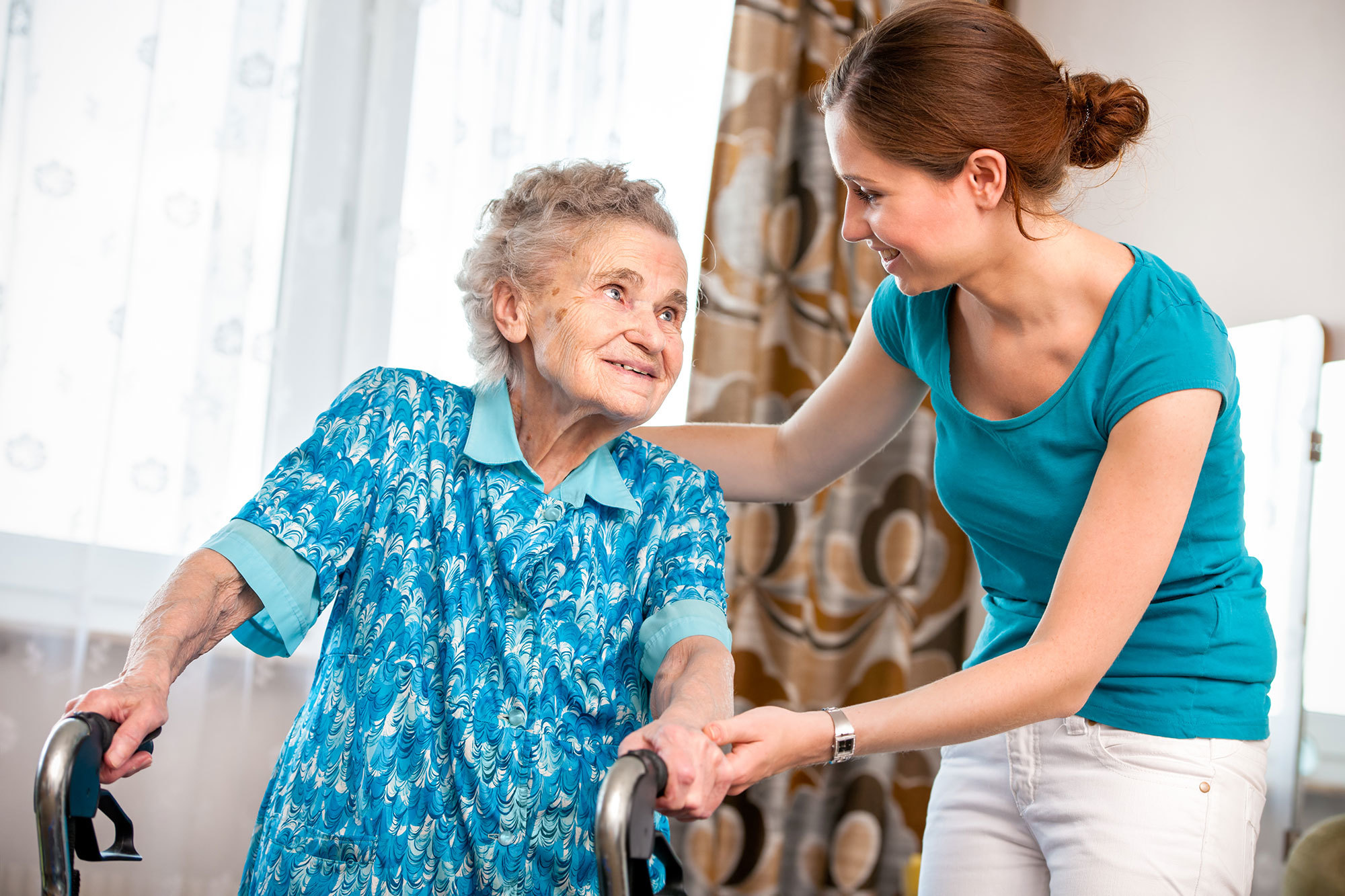 Older woman with a personal care assistant