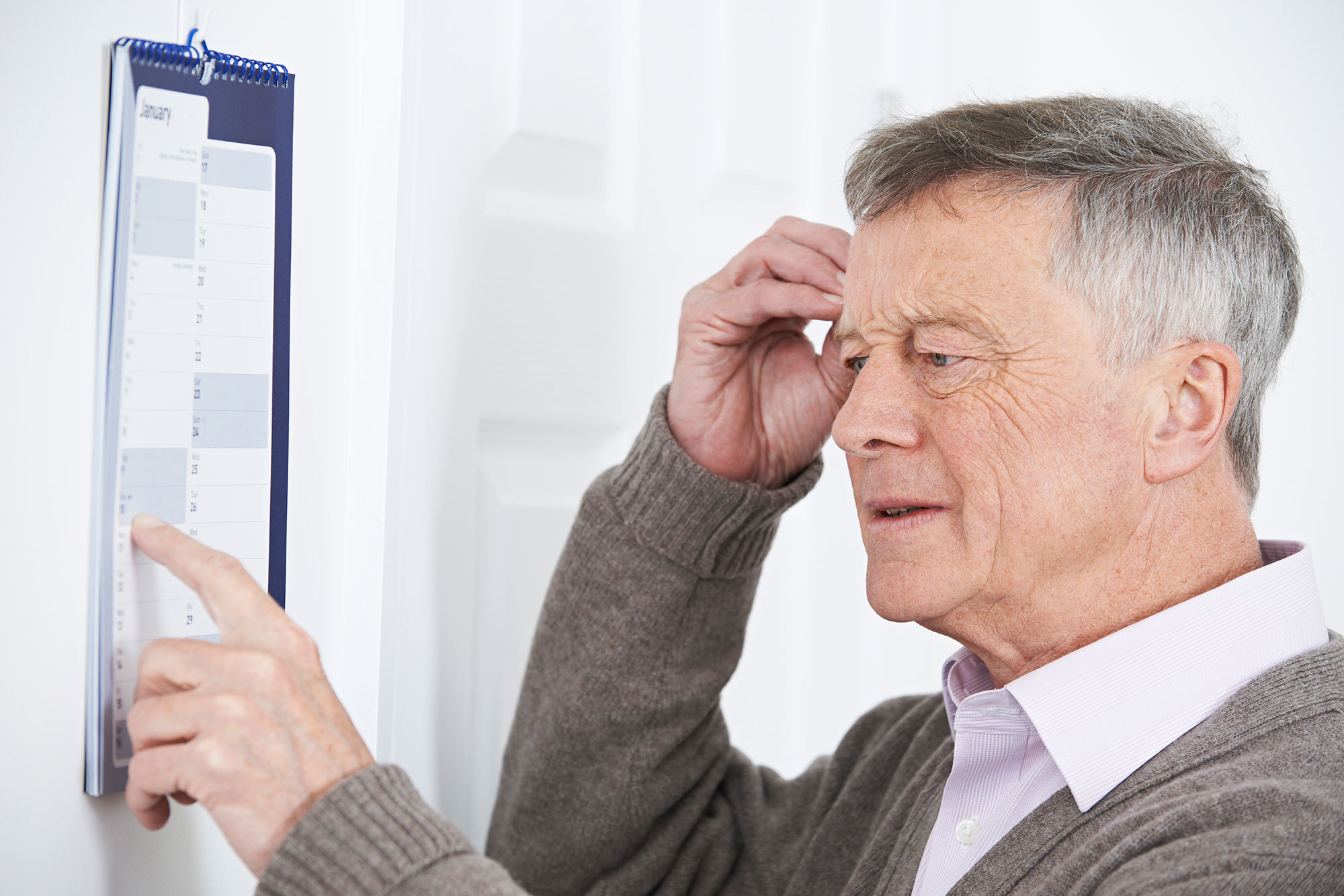 Older man looking confused.