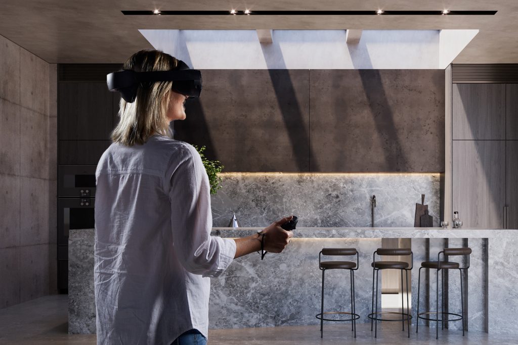 Render of woman using VR headset to see a VELUX skylight.