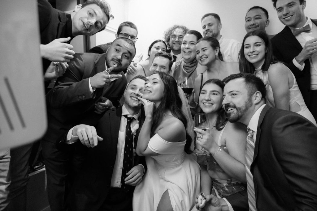 Nissie Bungbrakearti smiles with friends in formal wear