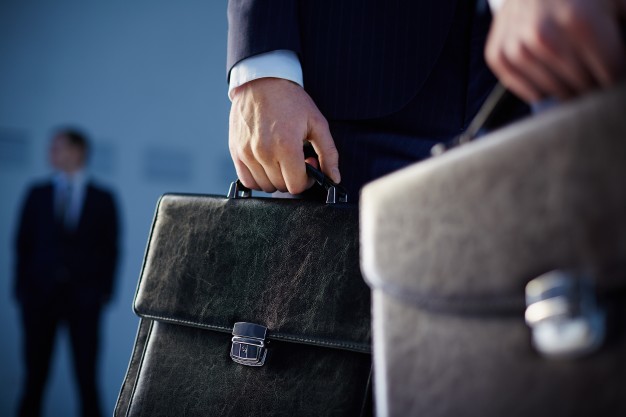close-up-of-workers-with-briefcases_1098-3096.jpg close-up-of-workers-with-briefcases_1098-3096.jpg