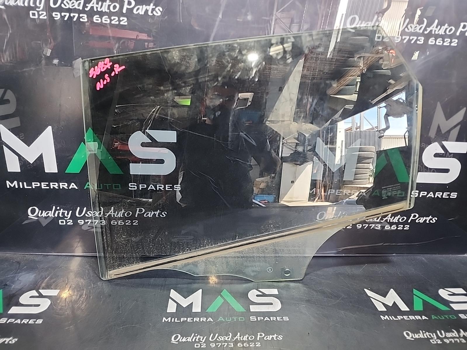 Left Rear Door Window 3 Mazda 2008